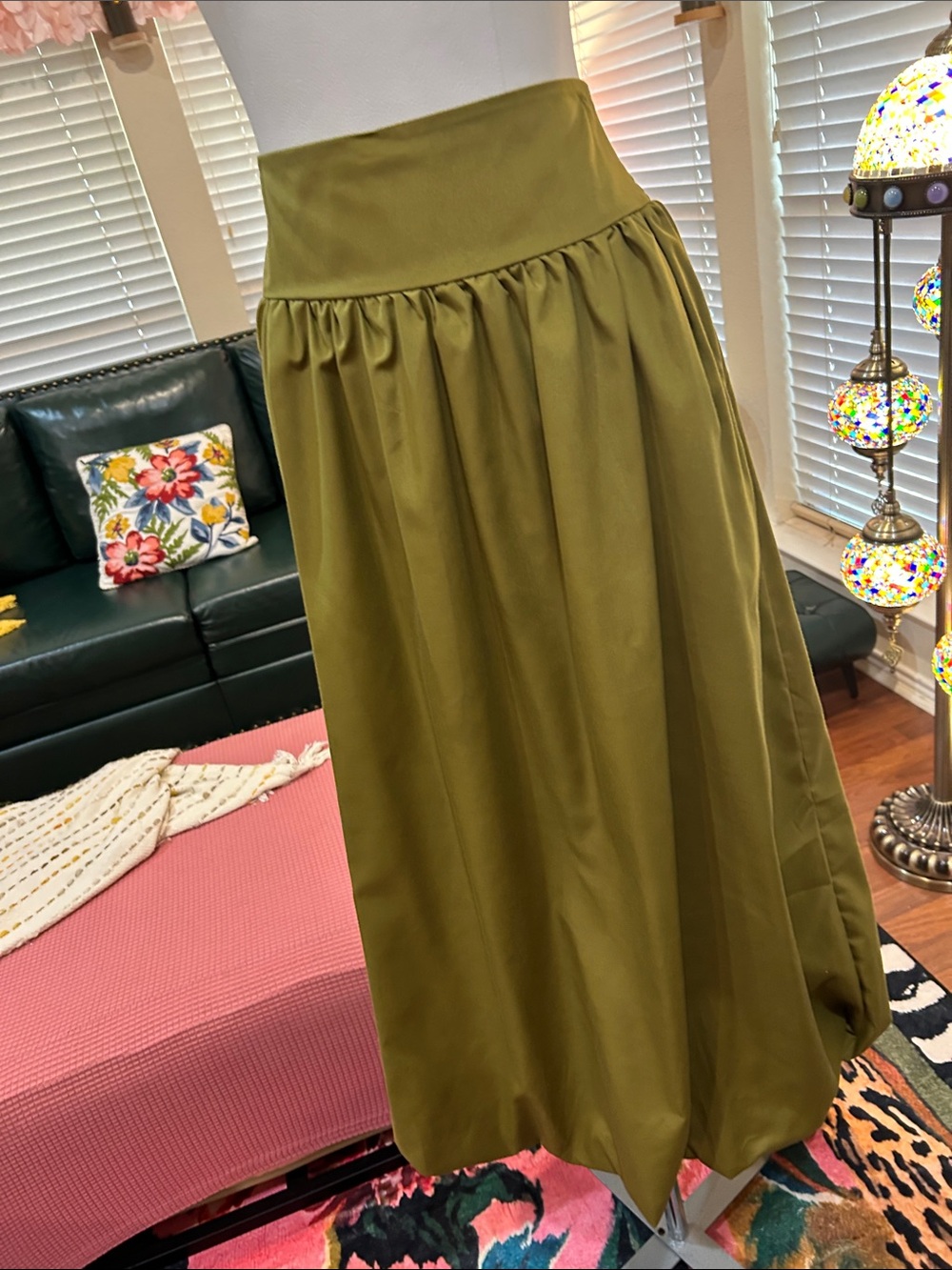 High-Waist Olive Green Maxi Skirt with an elastic waist gathered in the back